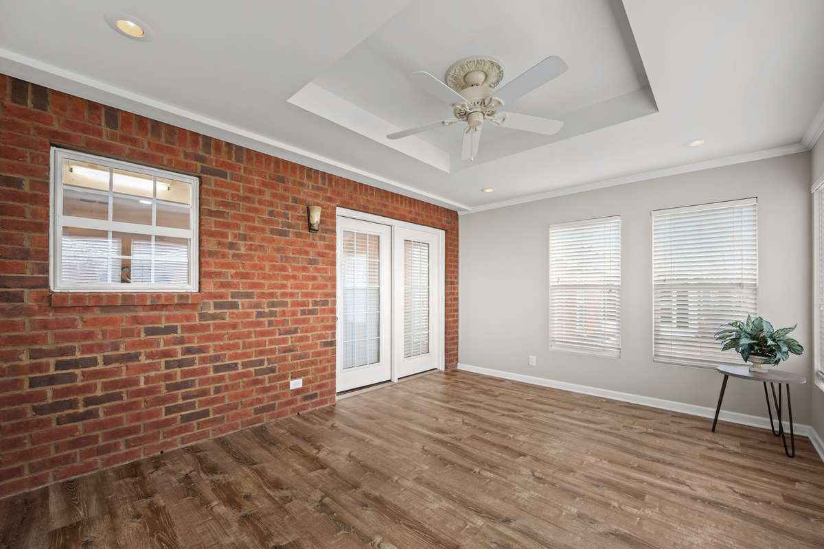 Sunroom is well constructed with the same luxury vinyl plank flooring that runs throughout the rest of the home.