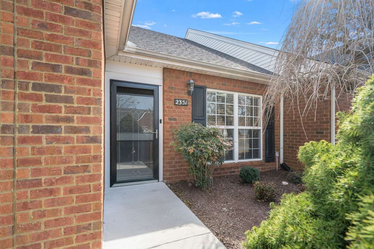 Owners added an extra layer of security with enclosed entrance with storm door.
