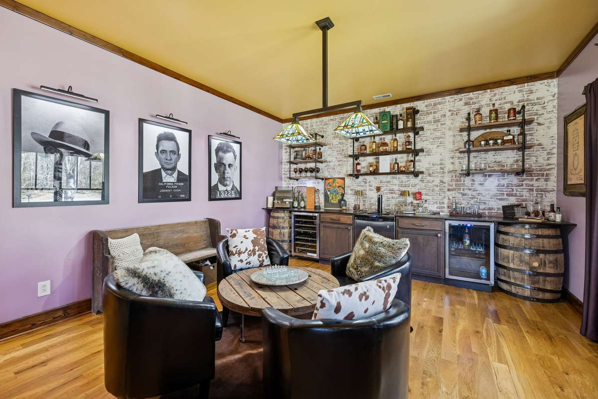 Welcome to "The Bourbon Room" - a great place for gathering with family or friends! The two smaller refrigerators and the "Kegerator" in the middle of the counter are negotiable.