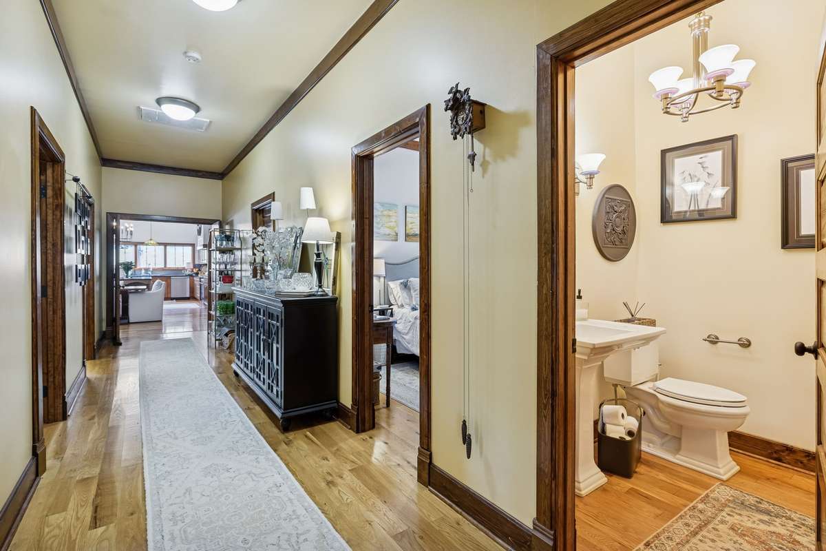 Hallway with Half Bath to the right.