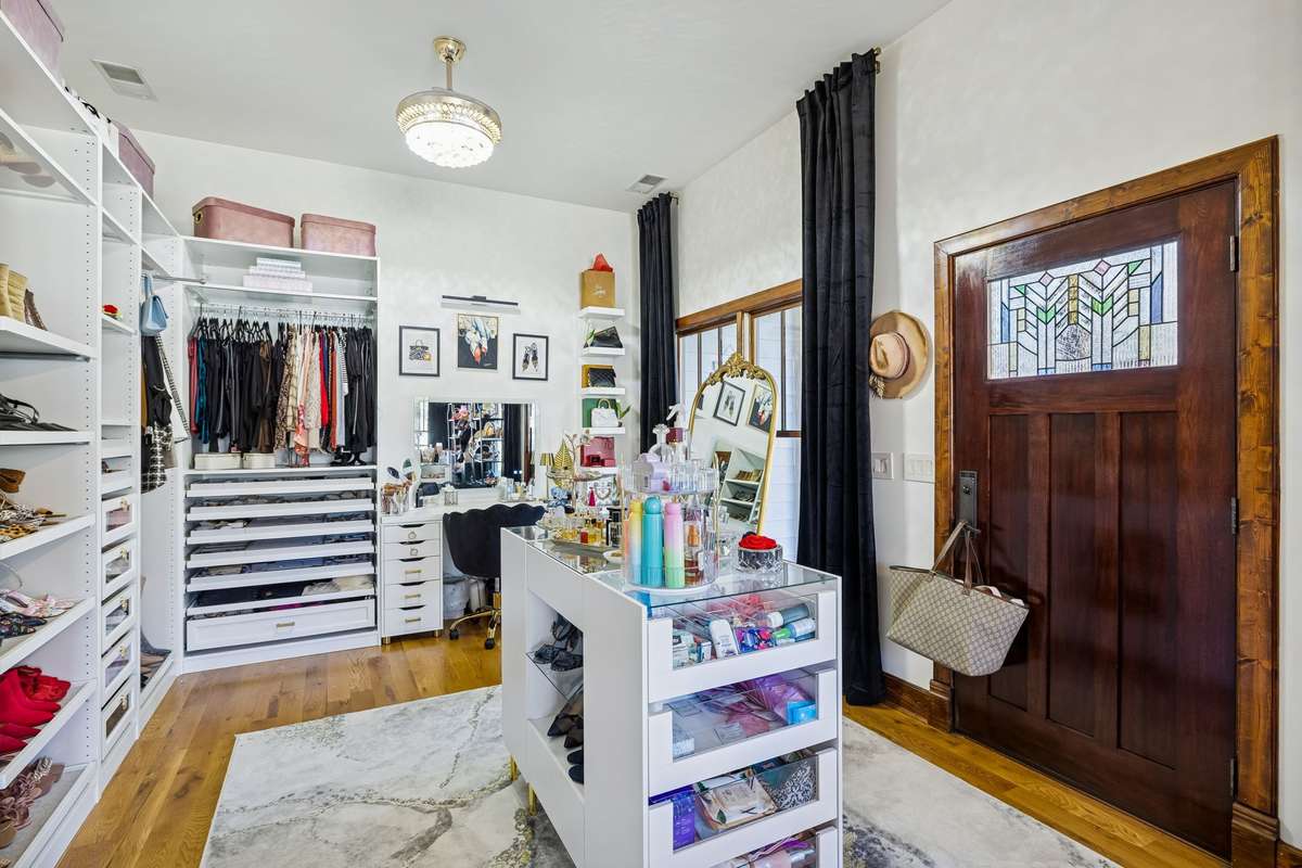 This side of Office #2 is being used as a very "hip" dressing room with cabinetry! There's even a furniture piece counter in the center!