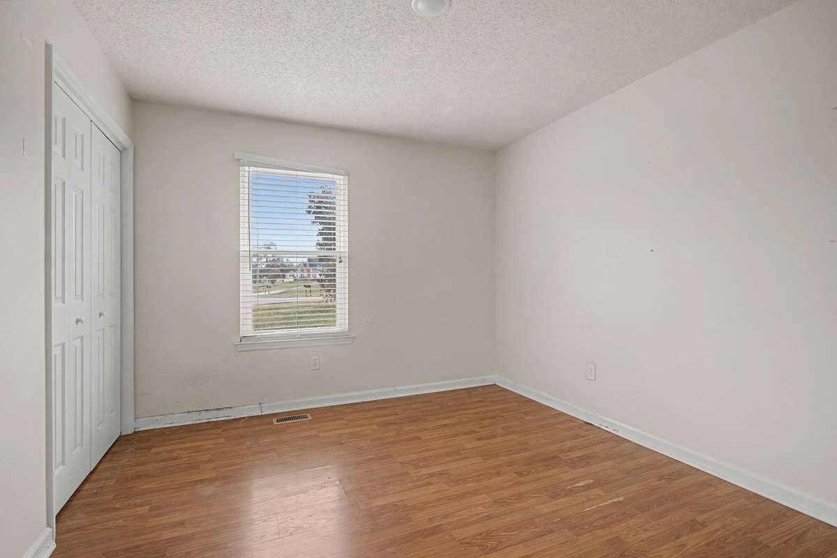 An abundance of natural light streaming in highlights the spacious rooms throughout!