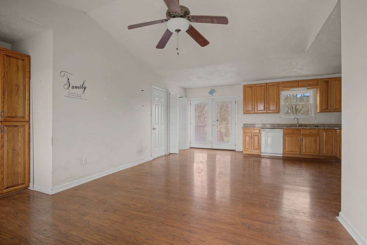 Double bay door lead to a massive back yard and let in all the beauty of the sun and moon!