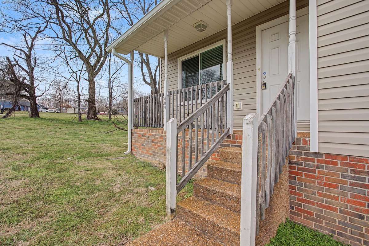 Blank space! Rocking chairs, porch swing, an outdoor bistro set build your dream front porch!
