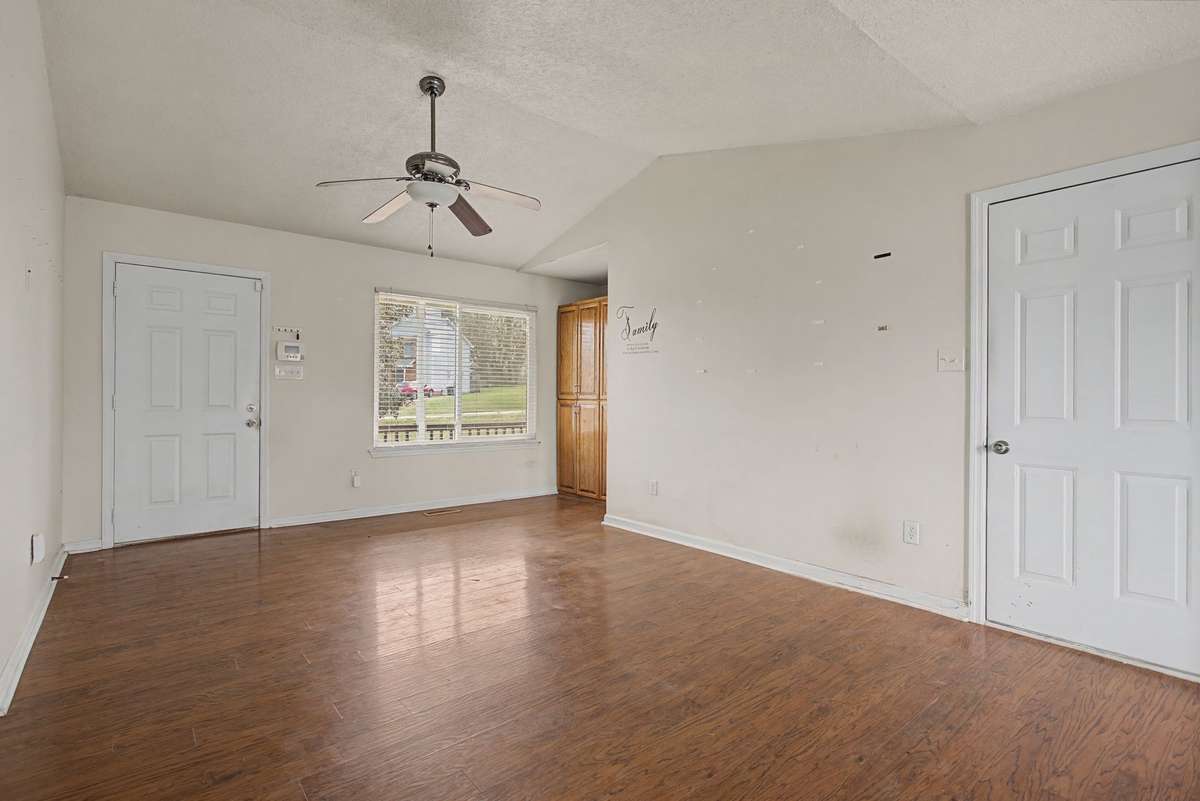 Large windows and vaulted ceilings provide a grand entrance into your open living space!