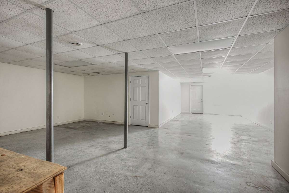 Featuring a light open color palette your fully finished basement is ready for your personal touch!