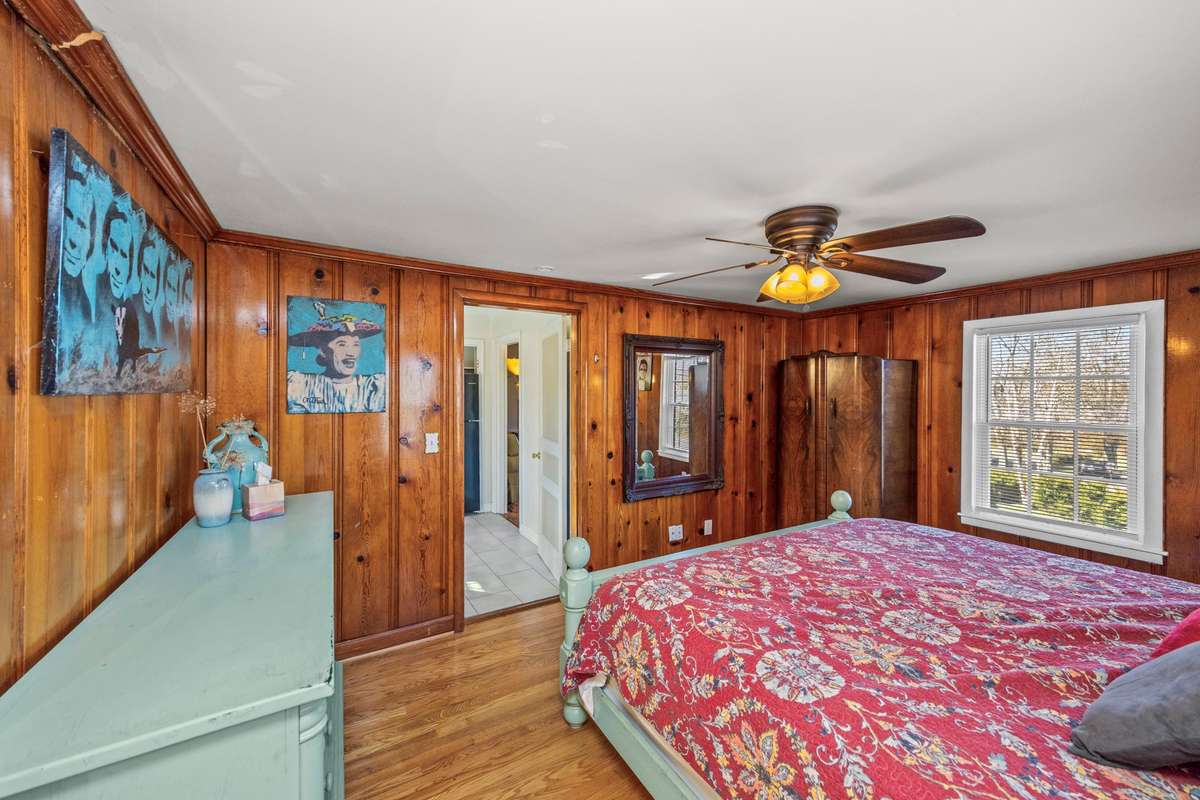 This bedroom is big enough for a king bed and suite set. With plenty of room left over.