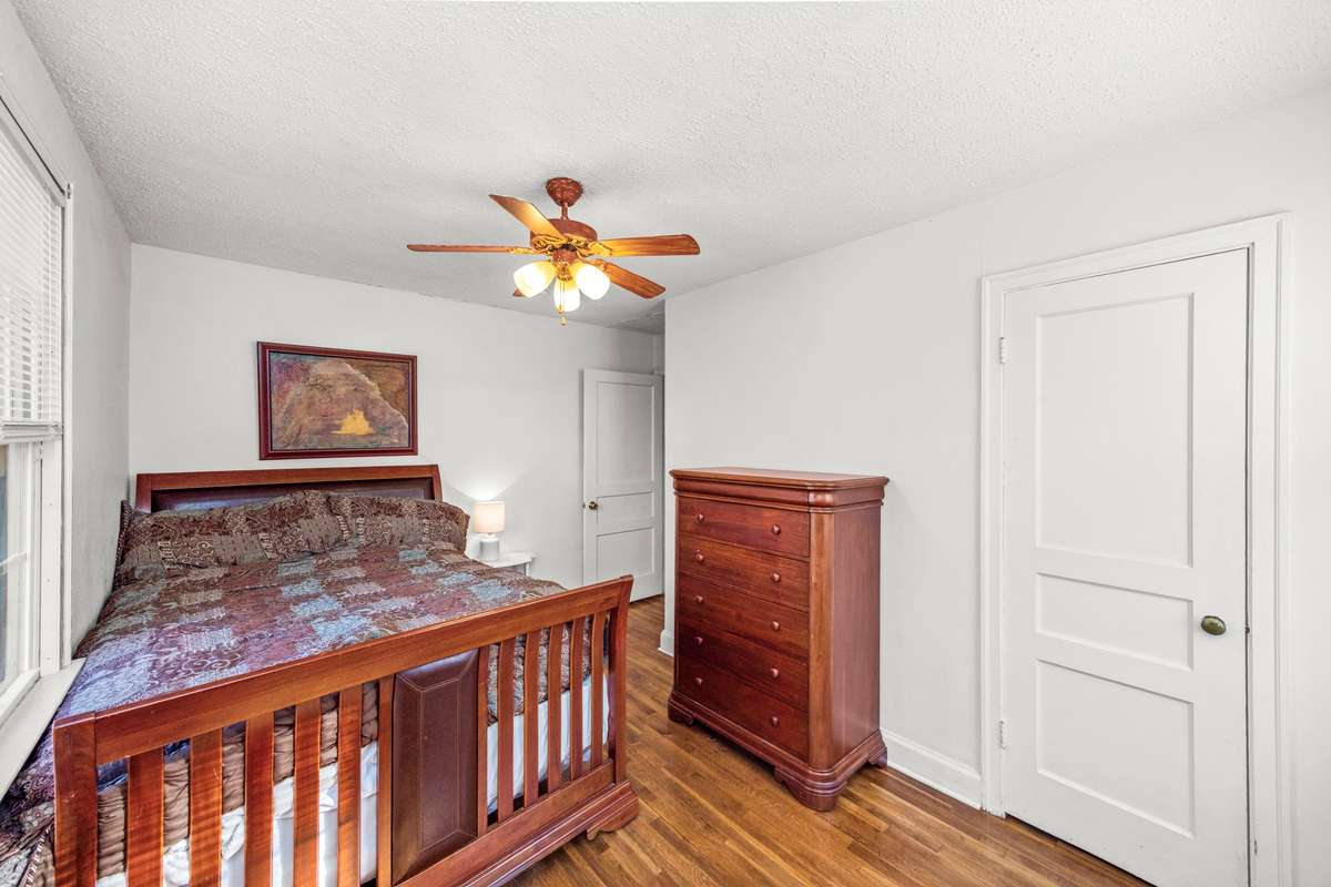 The bedroom and closet doors are all the original hardwood doors from when the home was built.