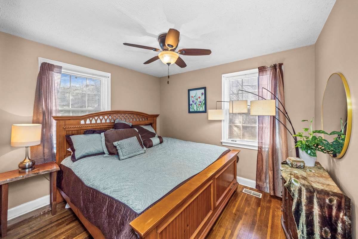 This is the bedroom at the back of the home. This is a king bed so plenty of space for a guest room or home office.