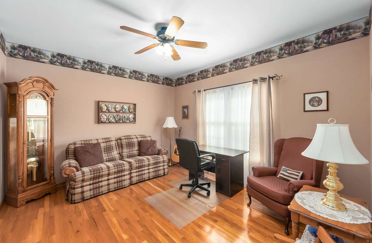 Office or bedroom with walk-in closet and bathroom.