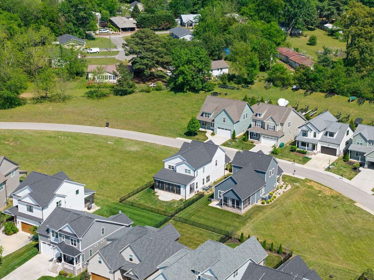 Aerial view highlighting the home’s location within this highly sought-after lake community.