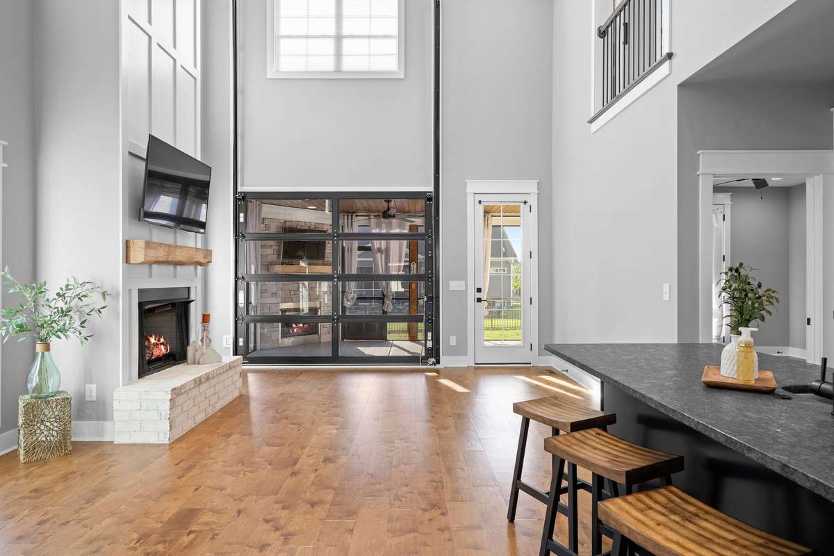 Stunning great room with fireplace feature wall and soaring ceilings for a true wow factor.