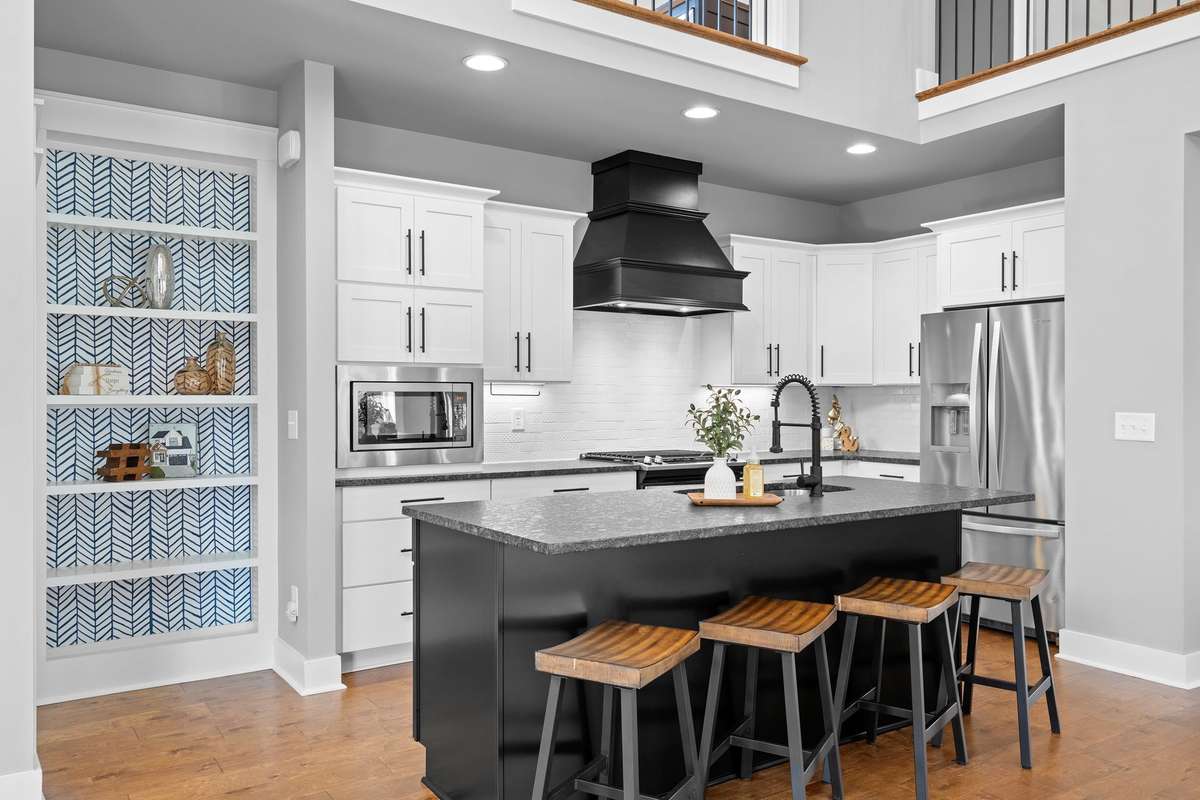 Bright and open kitchen layout flowing seamlessly into the main living areas.