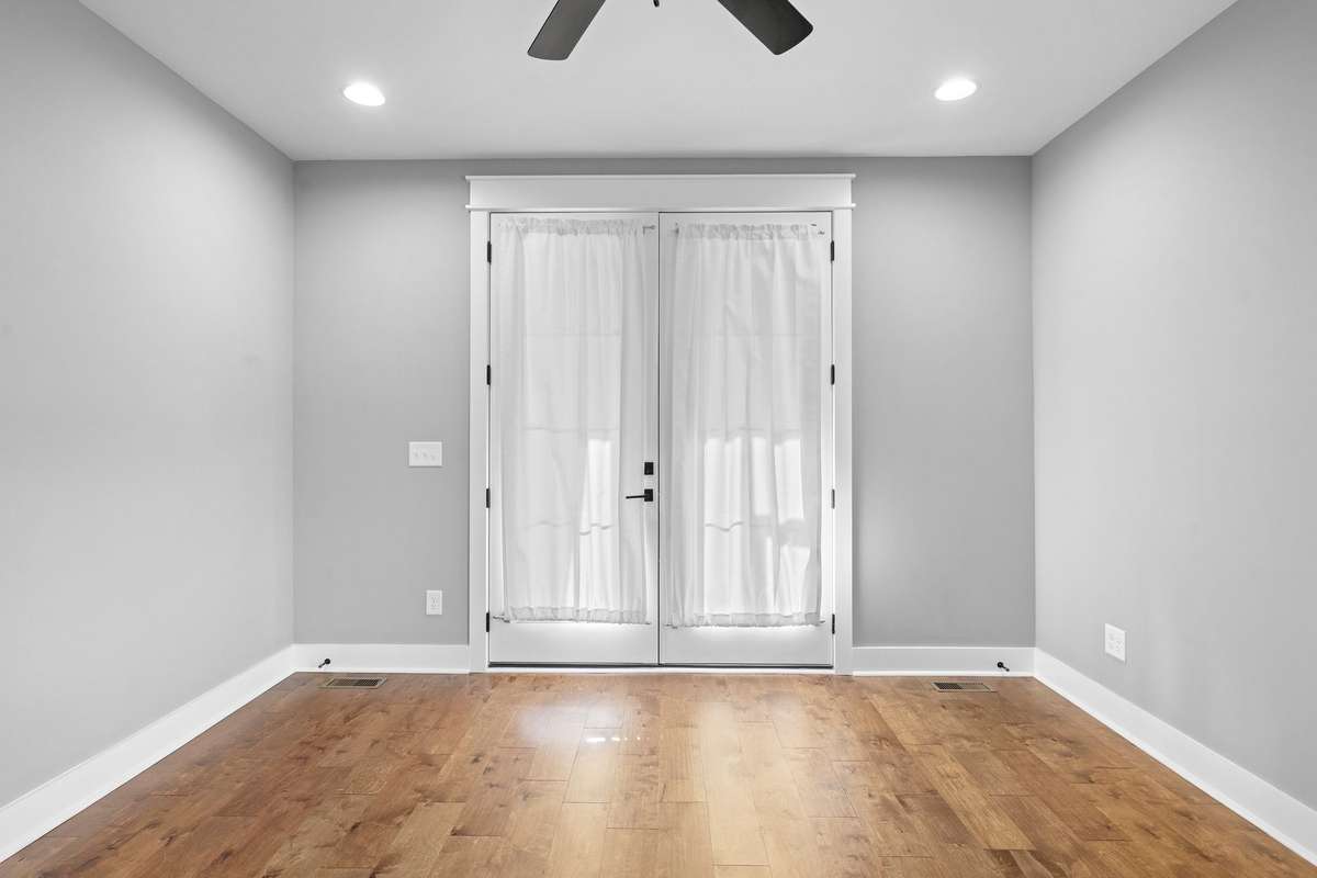 Private rear access from the primary suite—perfect for morning coffee or evening relaxation.
