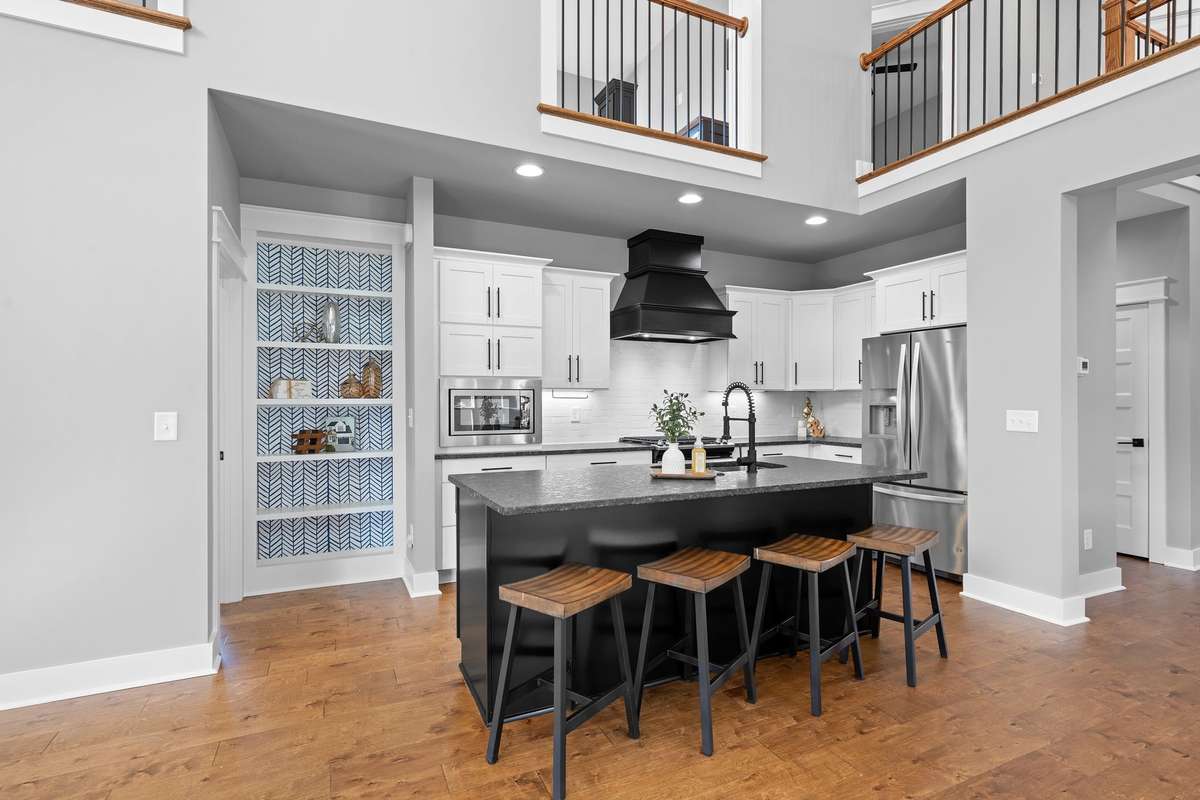 Well-appointed kitchen with abundant cabinetry, prep space, and thoughtful design.