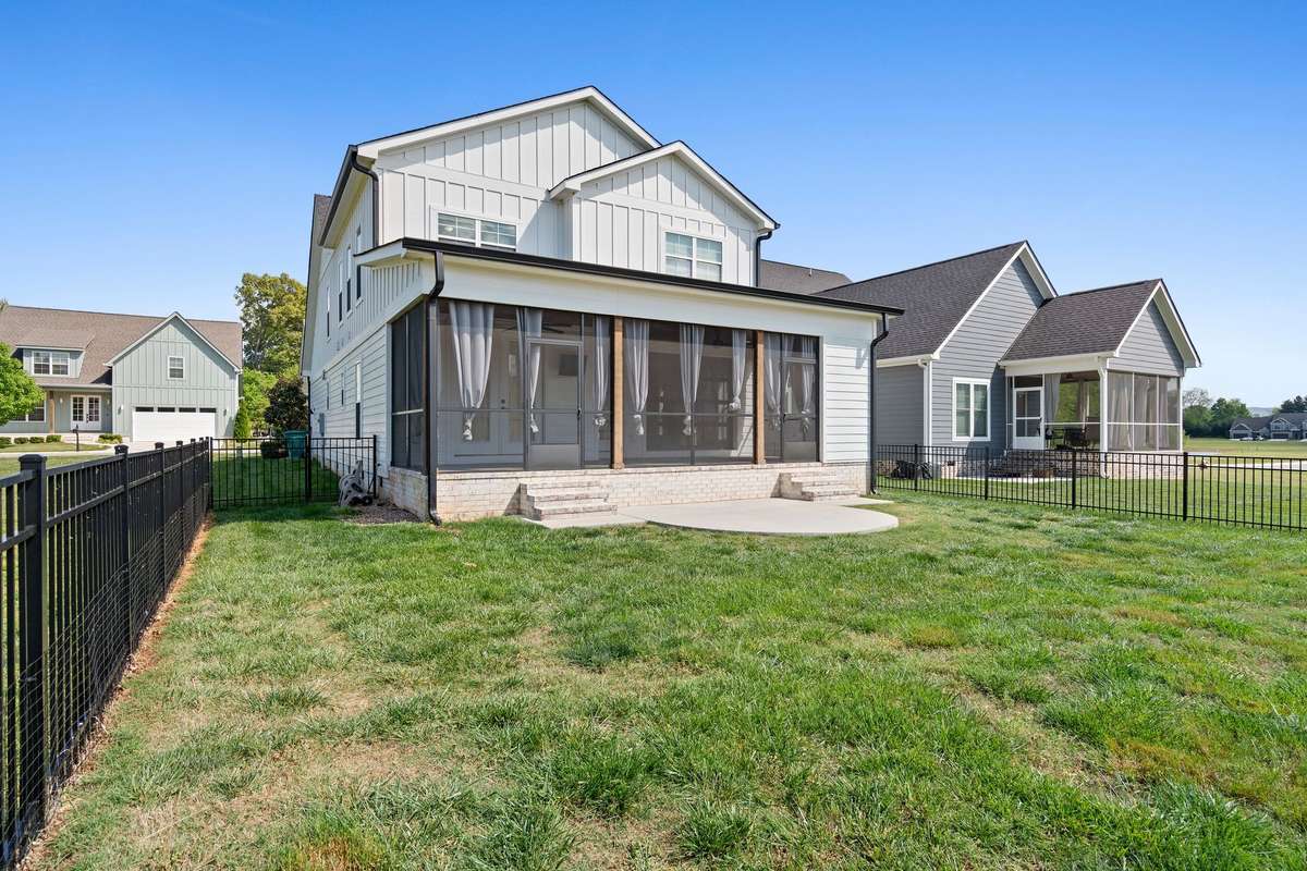 Fully fenced backyard—perfect for pets, play, or unwinding after a day on the lake.