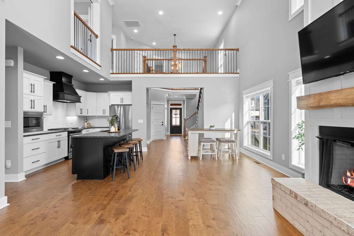 Custom kitchen with stainless steel appliances, sleek cabinetry, and modern finishes.