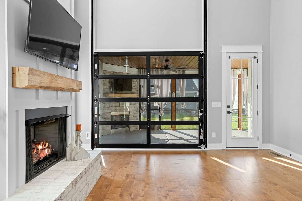 Beautifully designed screened porch with fireplace—perfect for year-round enjoyment.