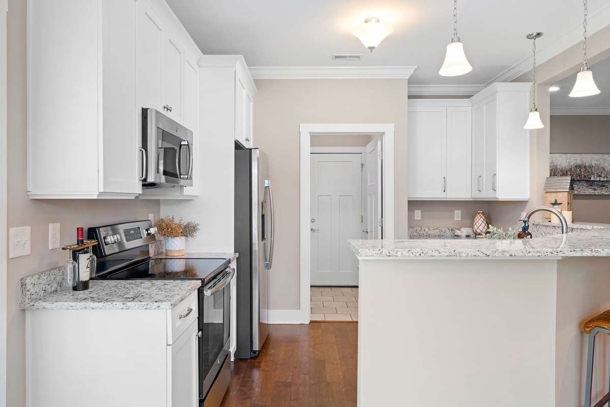 Spacious kitchen with abundant cabinetry and functional design.