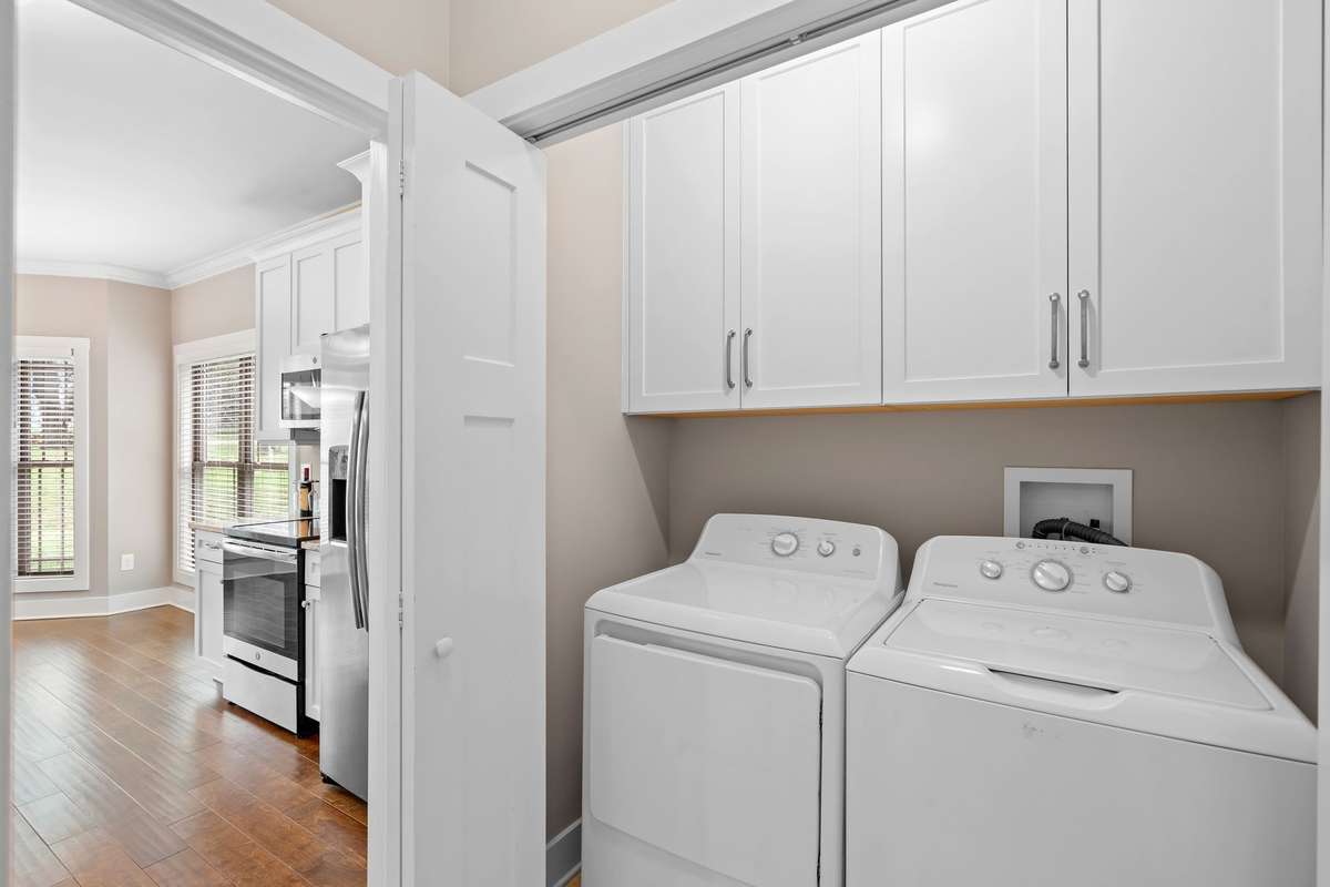 Laundry area conveniently located just off the kitchen.