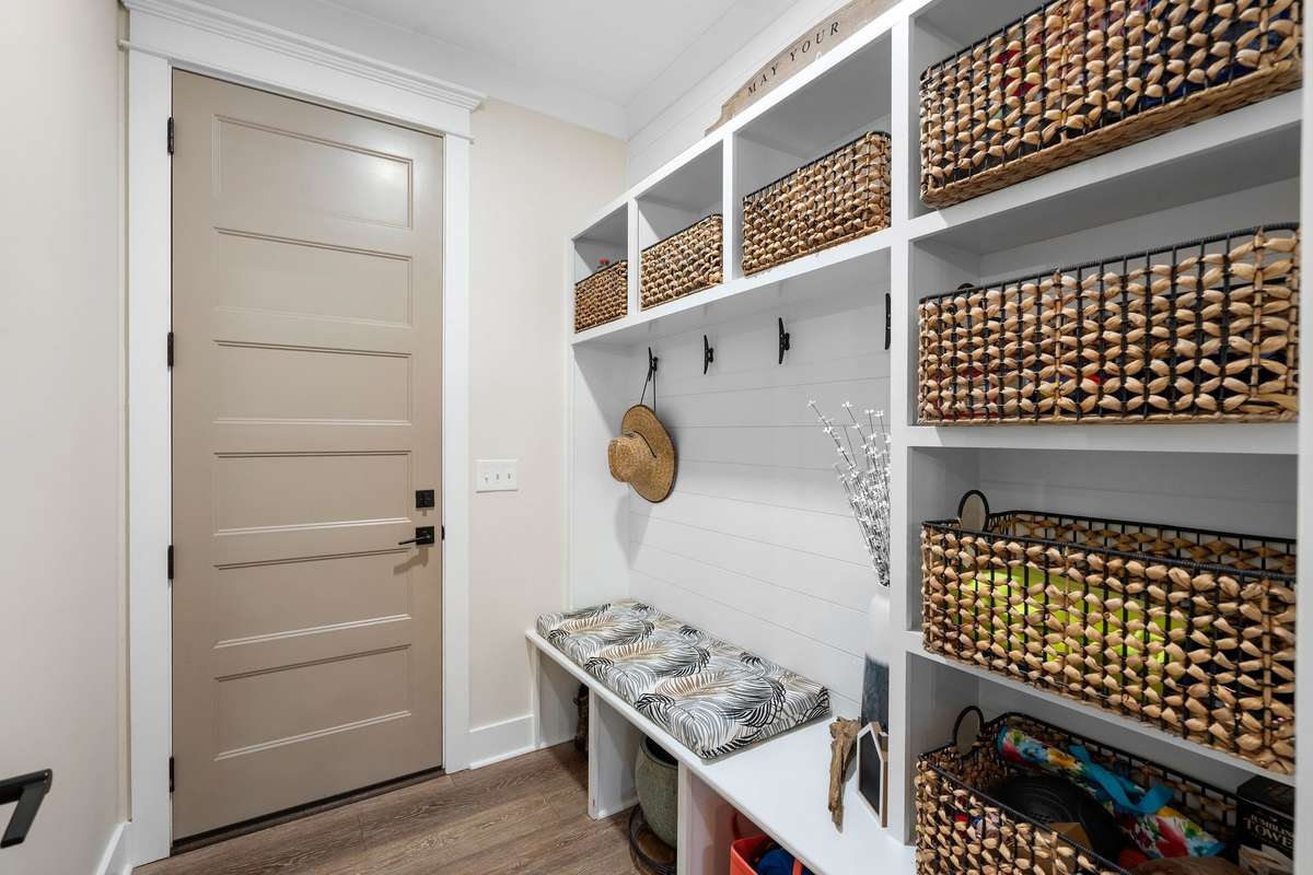 Functional mudroom with built-in storage, bench seating, and organization for everyday living.