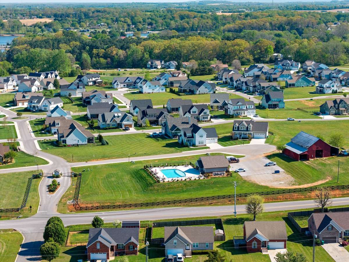 Welcome to Twin Creeks Village—featuring community amenities including a pool, clubhouse, and beautifully maintained grounds.