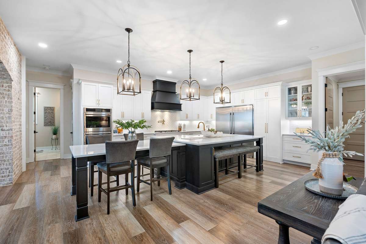 Expansive kitchen with abundant counter space, seating, and thoughtful design throughout.