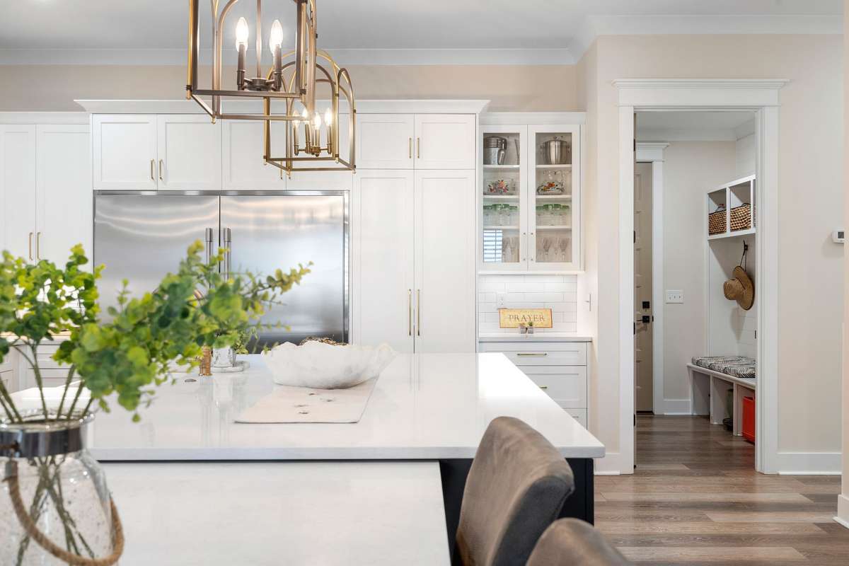 Large center island with seating—perfect for casual dining, gathering, and hosting.