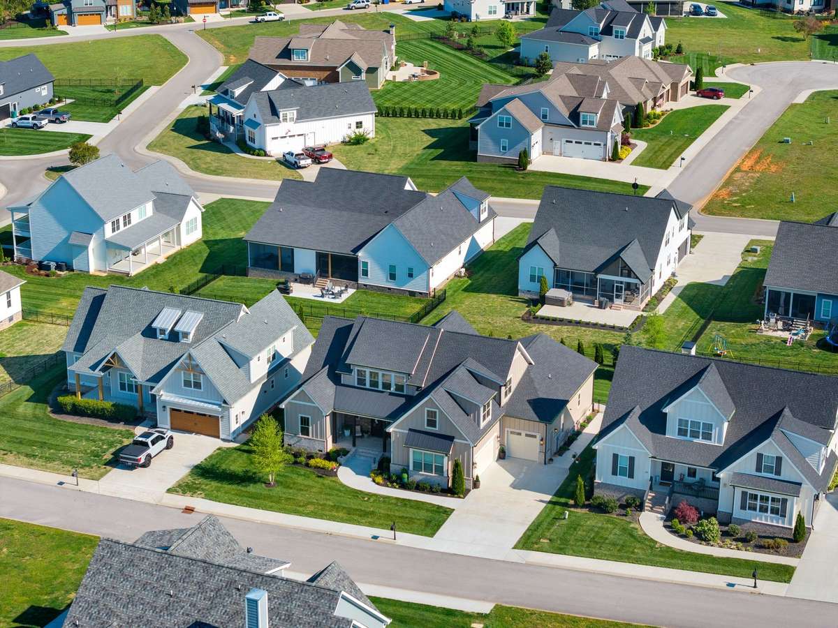 Beautiful aerial view showcasing the charm and layout of Twin Creeks Village—where community and lake living come together.