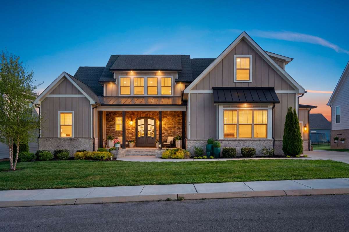 Mornings & Evenings just hit different here—warm lights, front porch sitting, and lake life waiting...