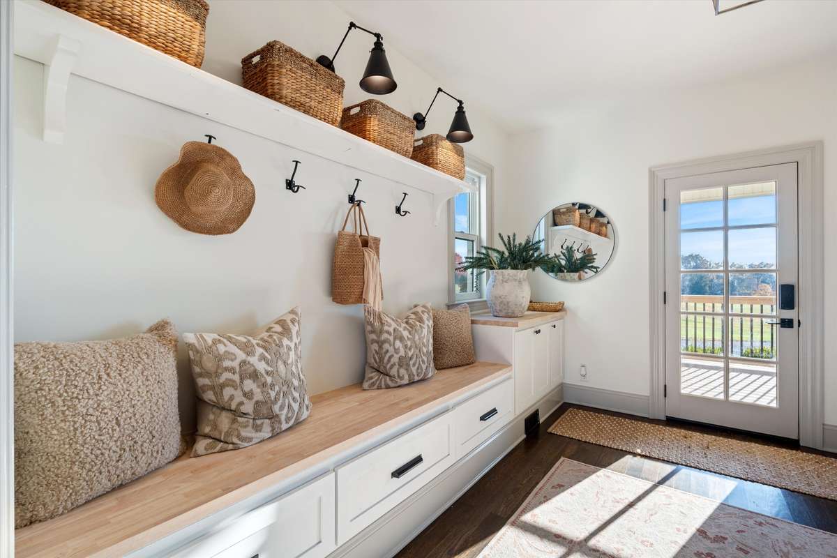 Large entry mud room with built in seating and storage