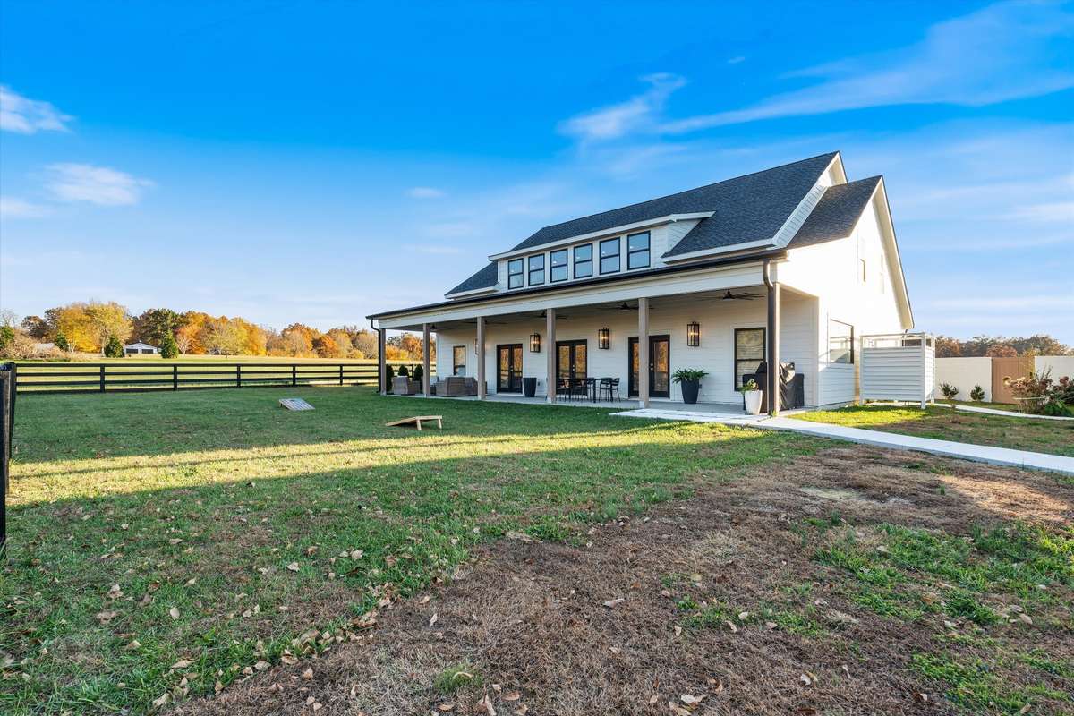 Back view of multiuse entertainment house and the 10x55 covered porch