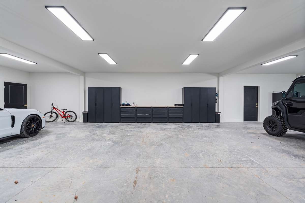 1352 sq ft garage area extra deep to maximize space, all garage doors equipped with wi-fi enabled, side mount openers to maximize head space in garage area.