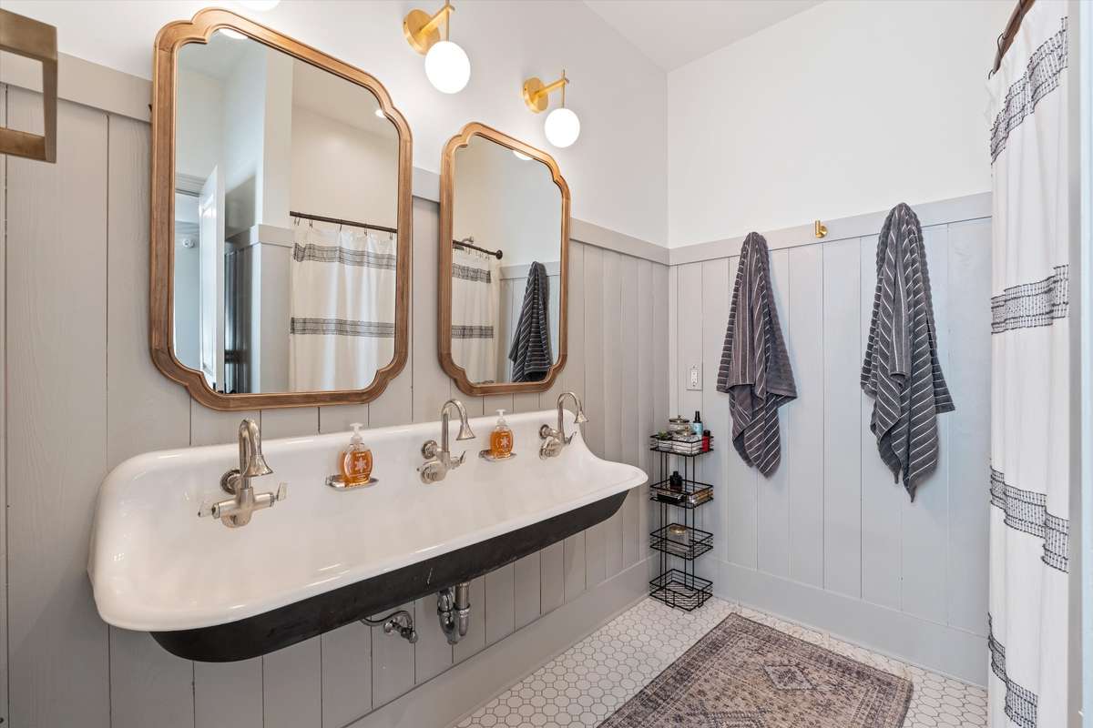 Upstairs full bath with triple faucet since and private toilet room