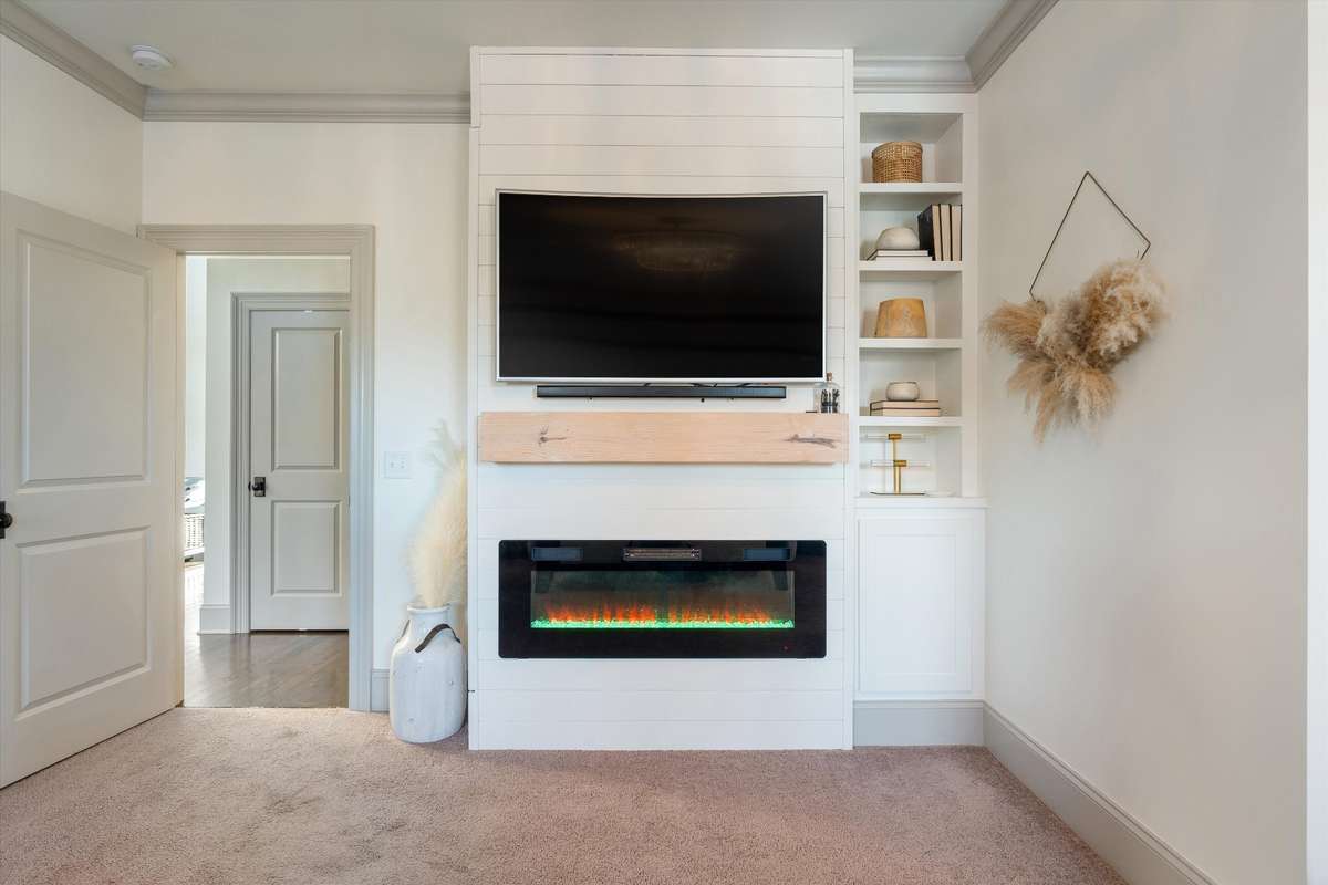 Primary Suite with electric fireplace