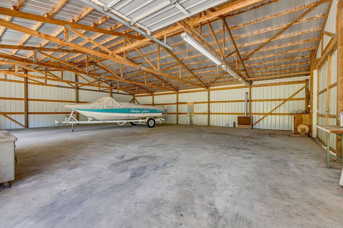 Want  a place for all your "toys" this summer?  How about enough room to celebrate the summer season with all of your friends?   Here is the answer to all your needs!   Check it out!
Lots of room for indoor and outdoor activities!