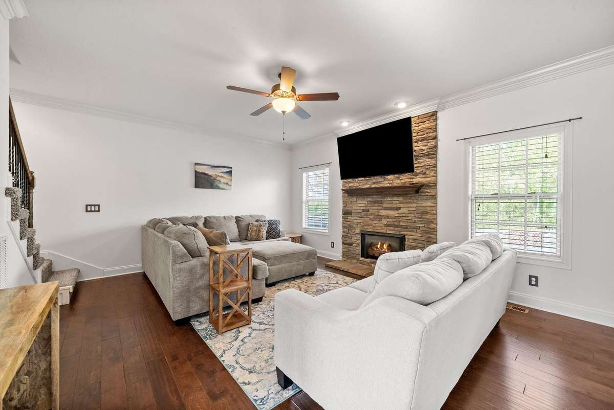 The stacked stone fireplace really amplifies the living room!