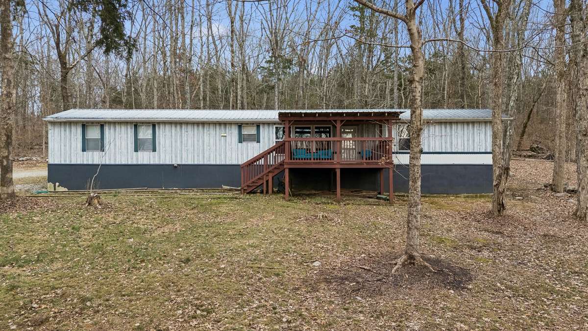 The manufactured home is installed on a permanent foundation and features 3 bedrooms and 2 bathrooms with comfortable living space and peaceful surroundings! 3726 Benders Ferry Rd, Mt Juliet, TN 37122