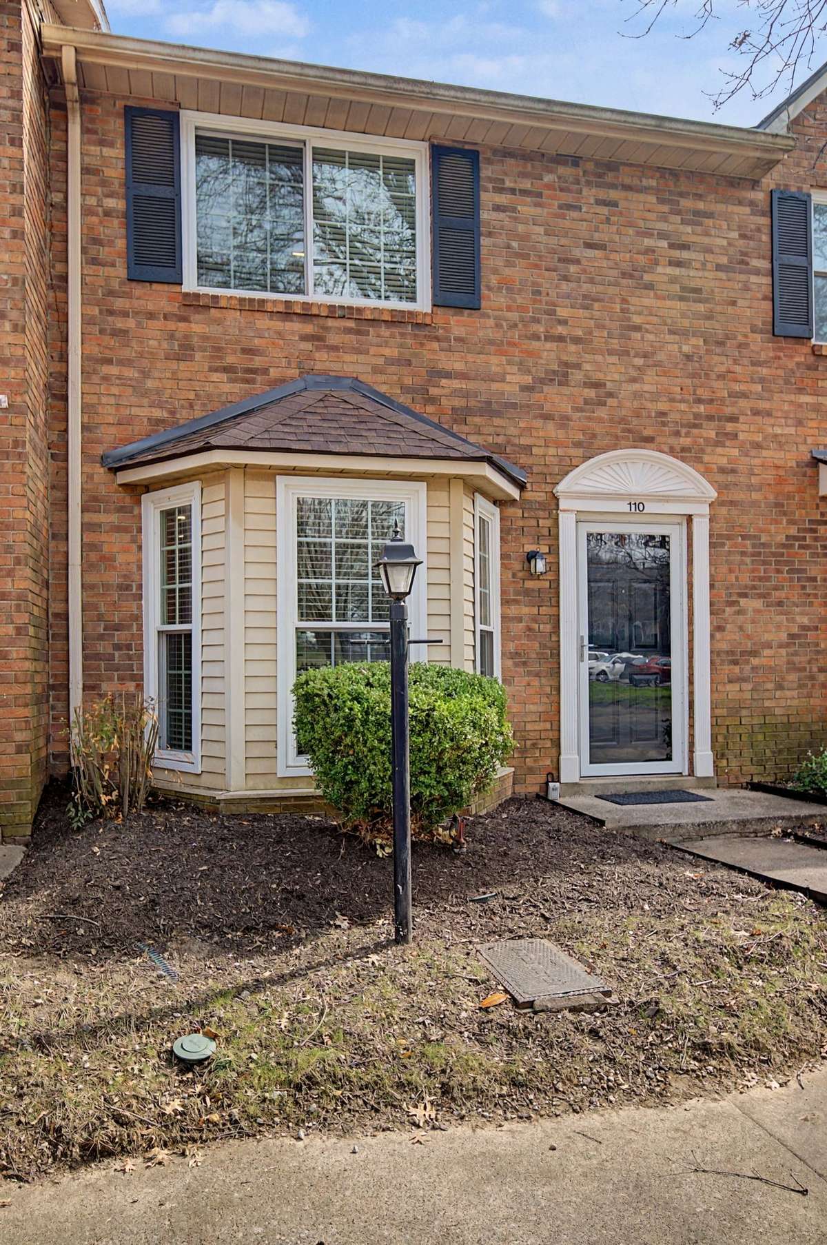 A lovely bay window provides additional space in the living room for your enjoyment and allows ample natural light to flood the room.
