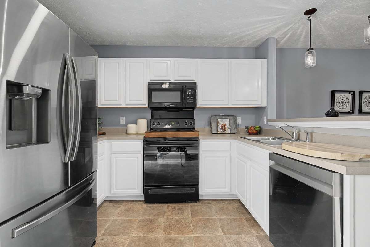 The kitchen cabinets just received FRESH COAT of PAINT.