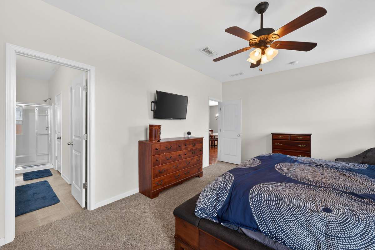 Ceiling fan and tall ceilings.  Walk-in closet just inside primary bath