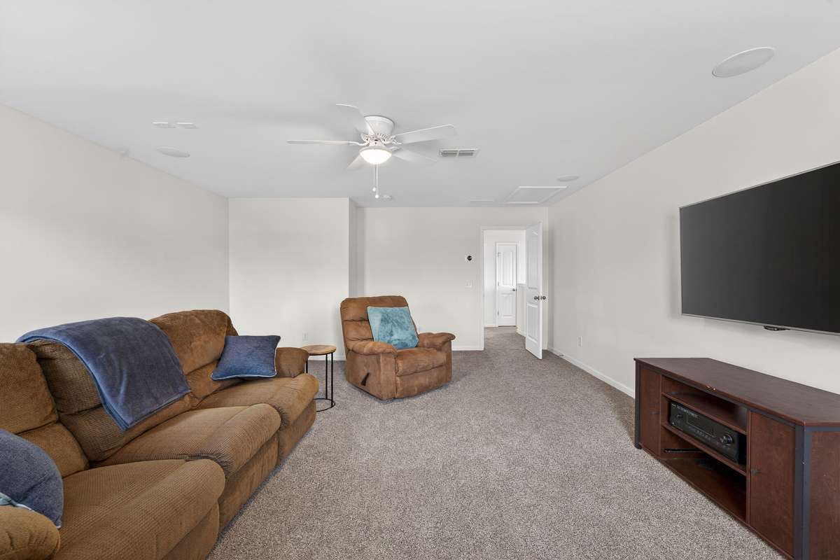Surround sound installed with wires hidden in the wall.