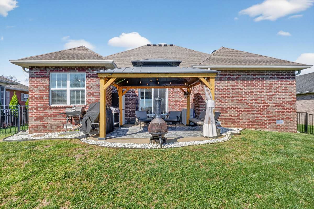 Enjoy the fully fenced-in backyard while sitting out back with friends and family