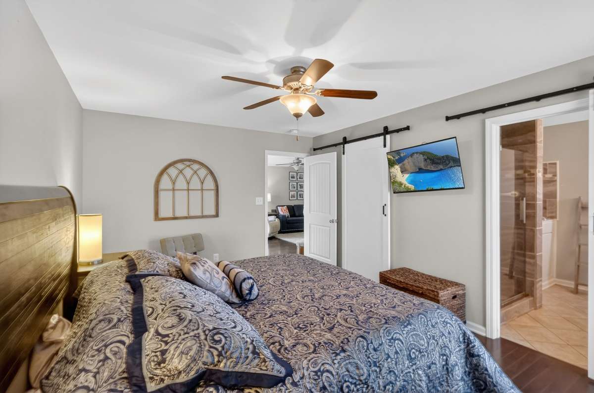 Primary with a beatiful bathroom and walk in closet