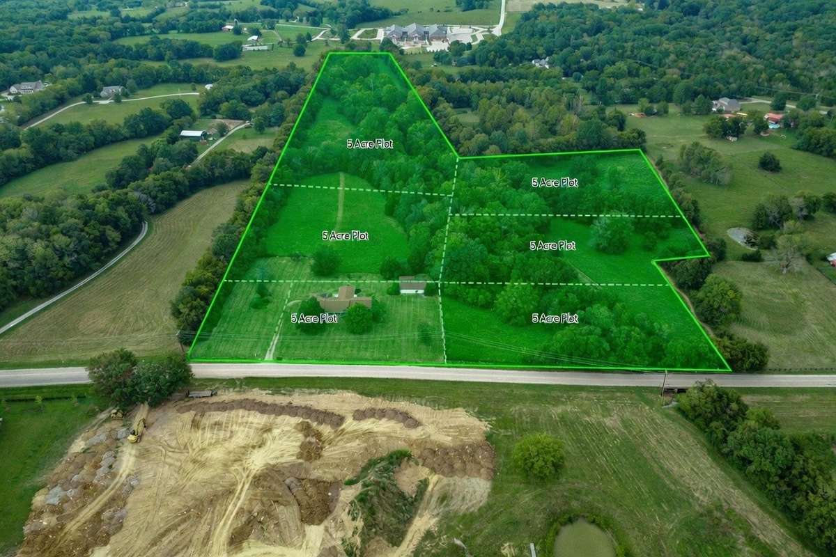 Potential visual of six 5 acre building plots with one road down the middle.  This is just an example and not a guarantee of buildable sites.  Developers must perform all due diligence.