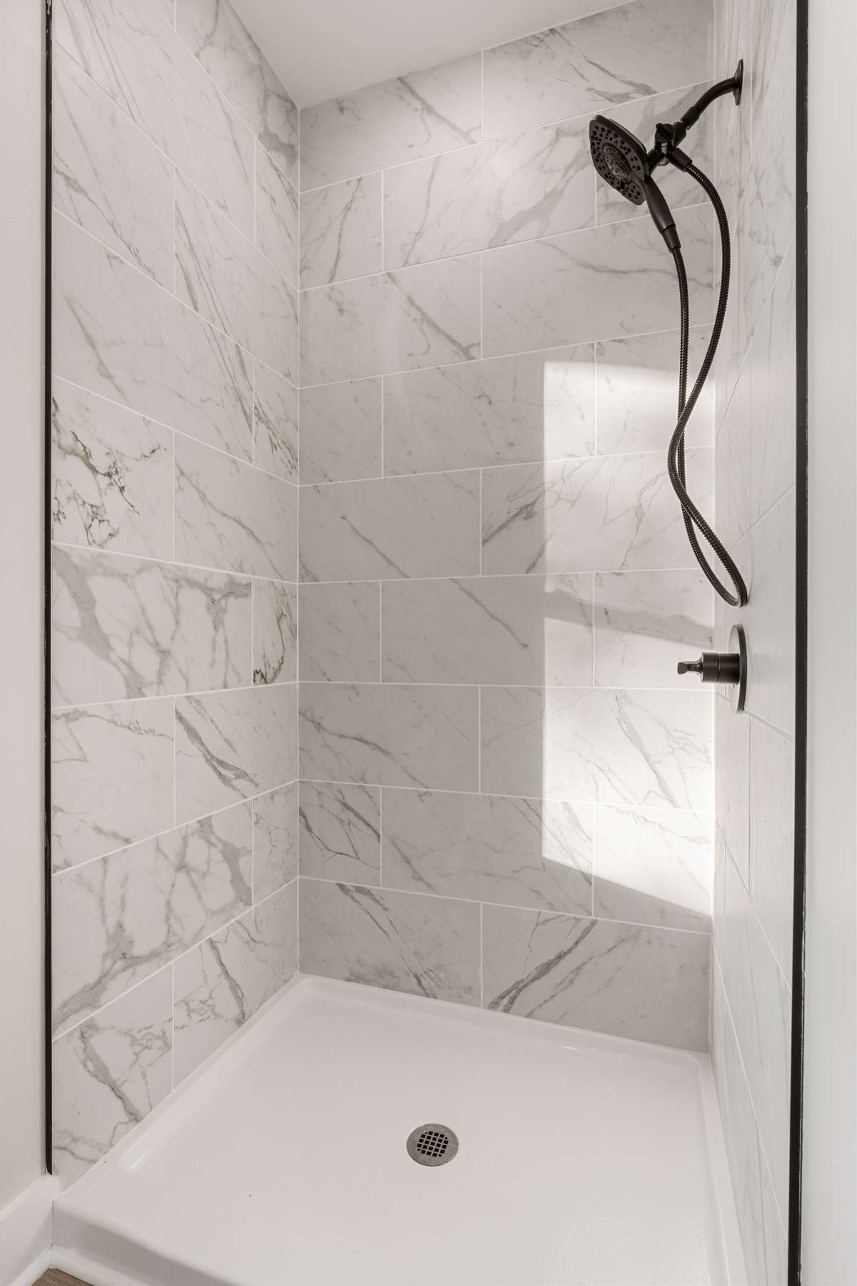 Primary Bathroom with tile shower
