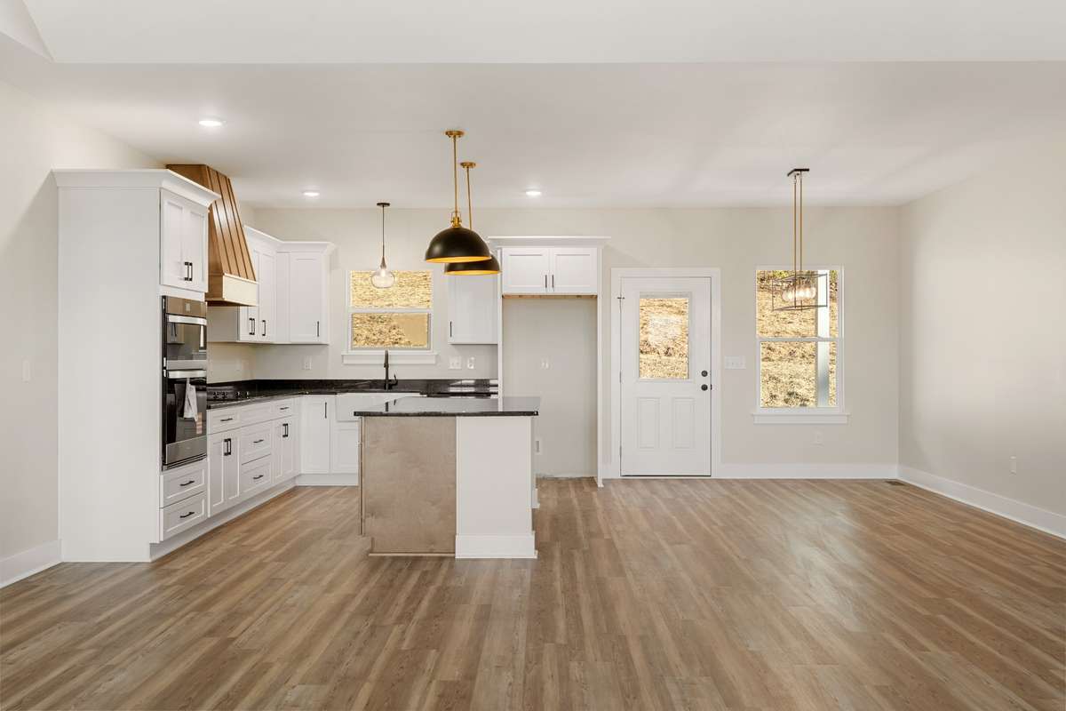Well Equiped Kitchen with electric smooth cooktop and oven/microwave wall ovens