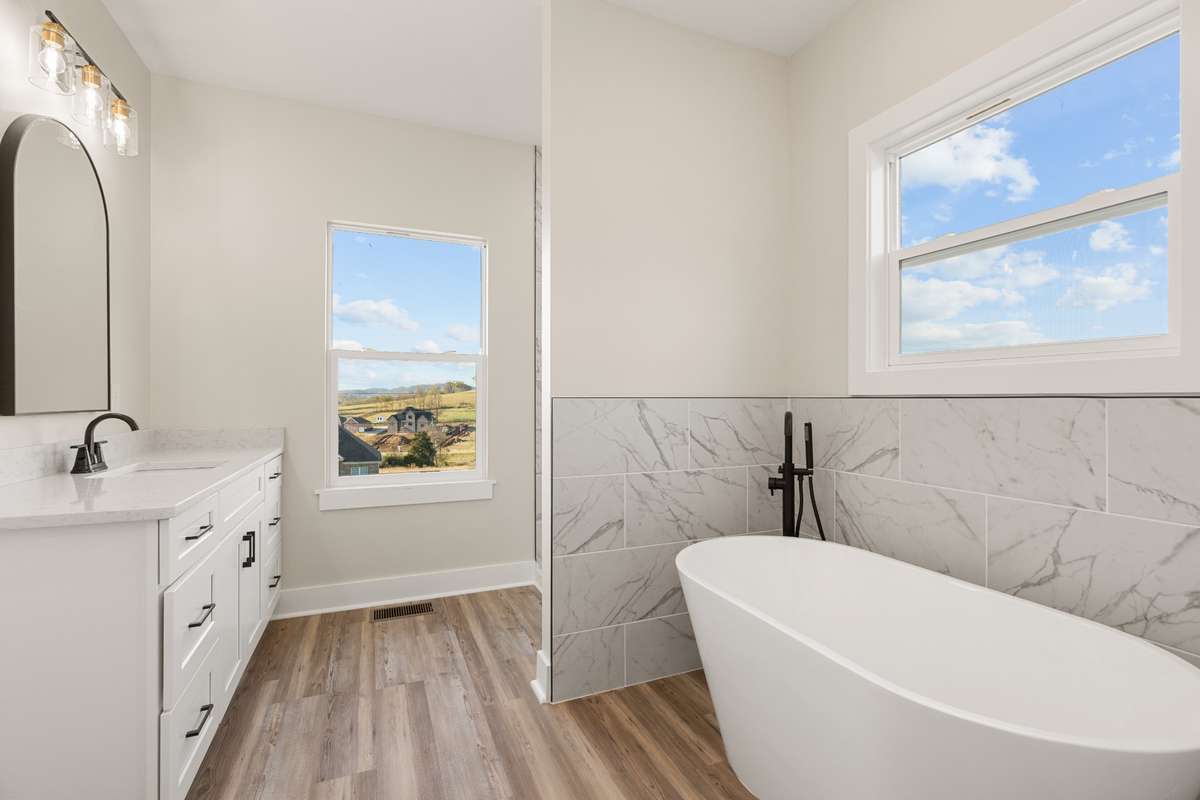 Primary Bathroom, soaking tub and separate tile shower