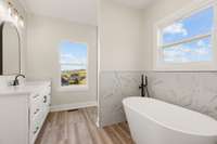 Primary Bathroom, soaking tub and separate tile shower