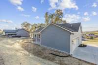 Rear of Home with 2 car garage